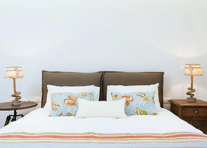 Poseidon Of Paros & Otel Chrisi Akti (Paros)