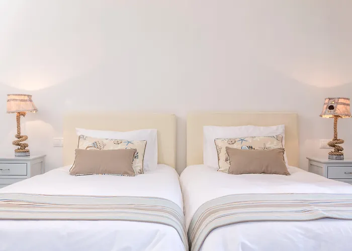 Poseidon Of Paros & Хриси-Акти